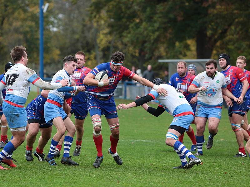 Ragbisté Vyškova (modré dresy) v Poháru ČSRU XV porazili spojený tým Říčany B/ARC Iuridica 21:17.