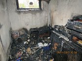 Snímek po zásahu hasičů u požáru dříví ve sklepních prostorách rodinného domku v Písku na Jablunkovsku.