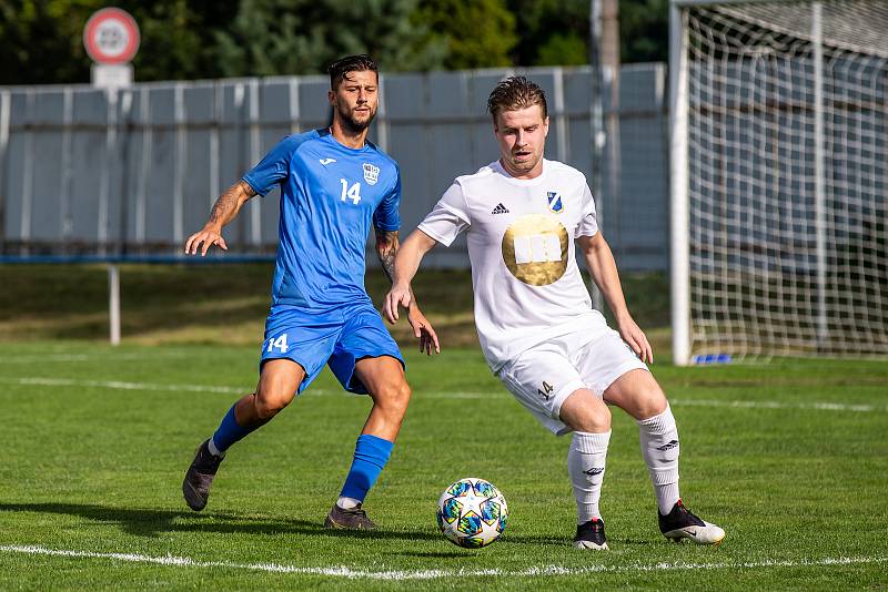 V okresním derby byly šťastnější Dětmarovice (v bílém), které zdolaly Havířov 2:1.