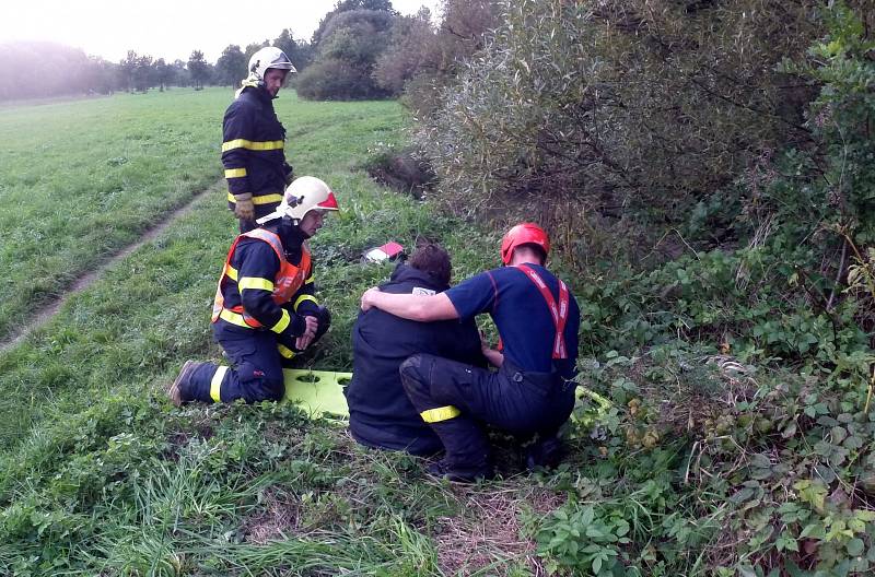 Záchrana tonoucího z rozvodněné řeky Lučiny v Havířově. 