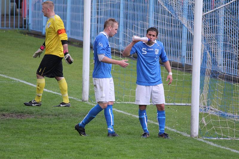 Havířov (v modrém) zdolal Mohelnici šťastným gólem v závěru.