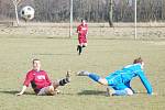 Z derby Petrovice (rudé dresy) - Albrechtice.