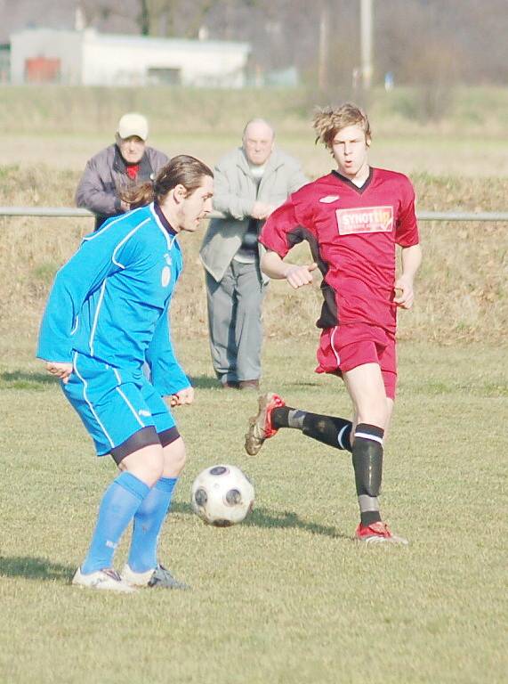 Z derby Petrovice (rudé dresy) - Albrechtice.