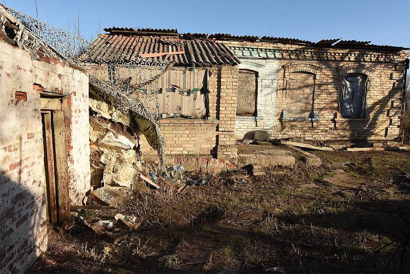 Bombardováním zničené domy ve vesnici Krasnohirivka.