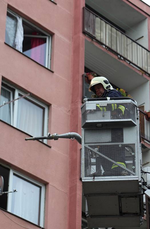 Požár bytu v Březinách.