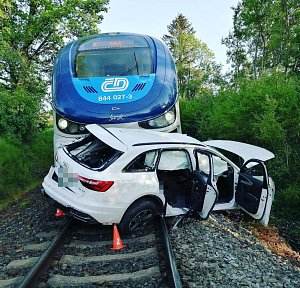 Smrtelná nehoda, srážka vlaku s autem v Rumburku.