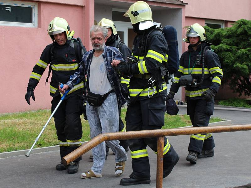 Požár bytu v Březinách.