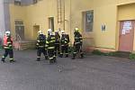 Tři hasičské jednotky vyjely k požáru v suterénu budovy bývalého Centrofloru v Dělnické ulici v Děčíně