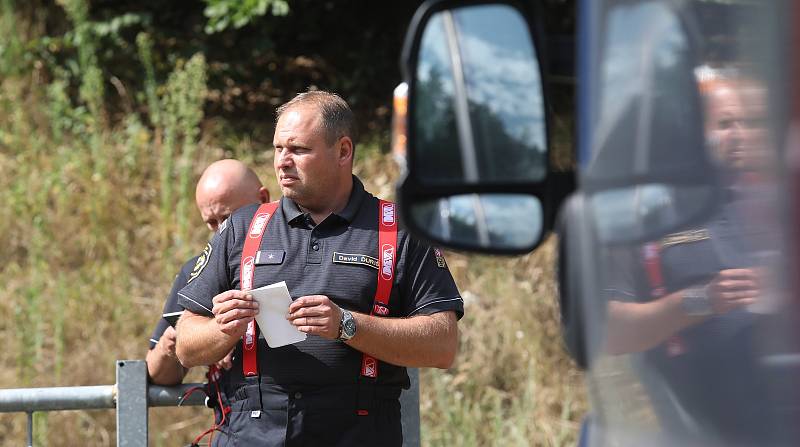 Hasiči bojují s požárem v Českém Švýcarsku. Středa 27. července.